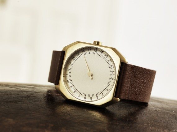 slow Jo gold case brown leather by slow watches on sofa
